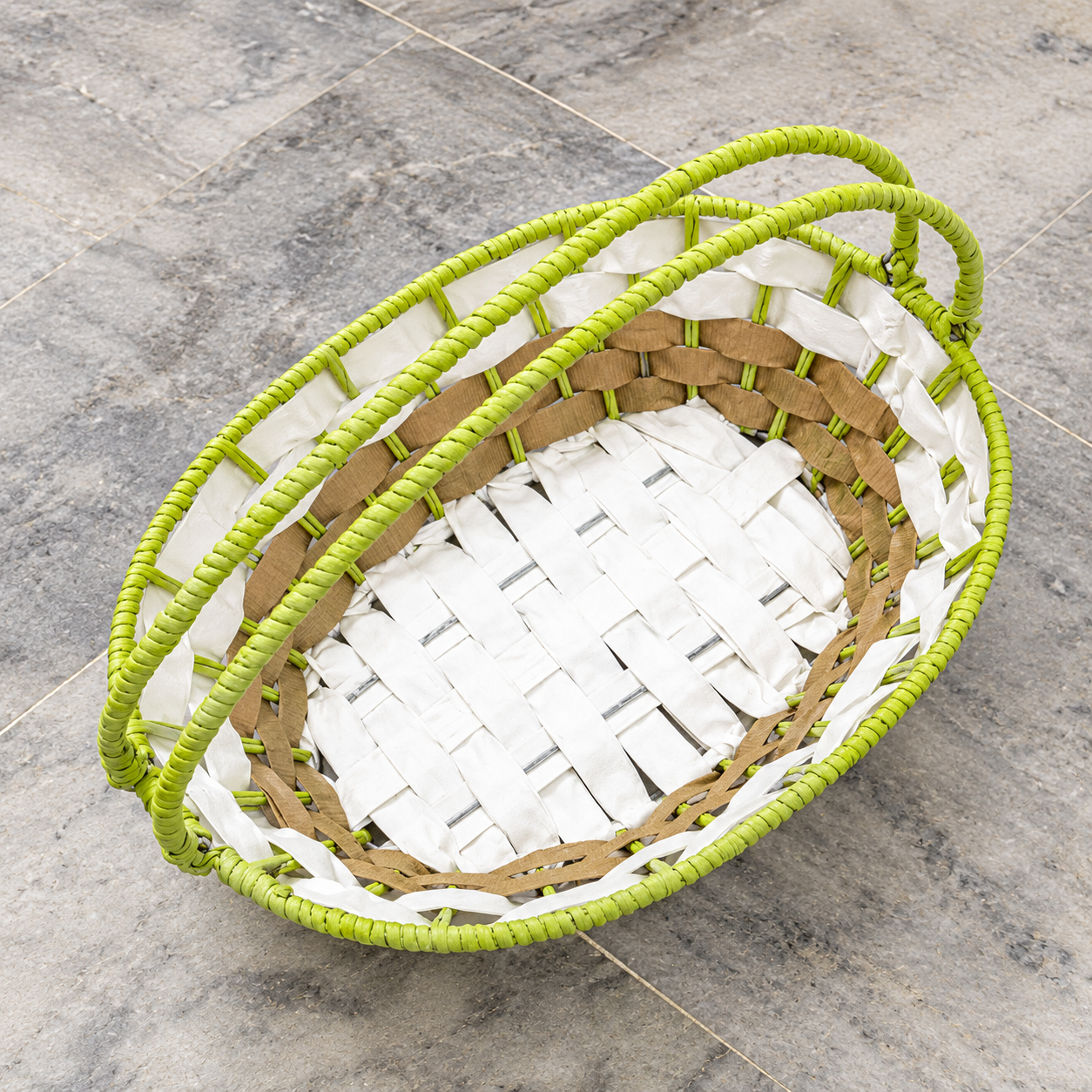 Green Oval Woven Basket with Two Handles and White-Brown Pattern